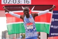 Kelvin Kiptum celebrates after winning the 2023 Chicago Marathon professional men's division at Grant Park in Chicago, Illinois.2023 Chicago Marathon